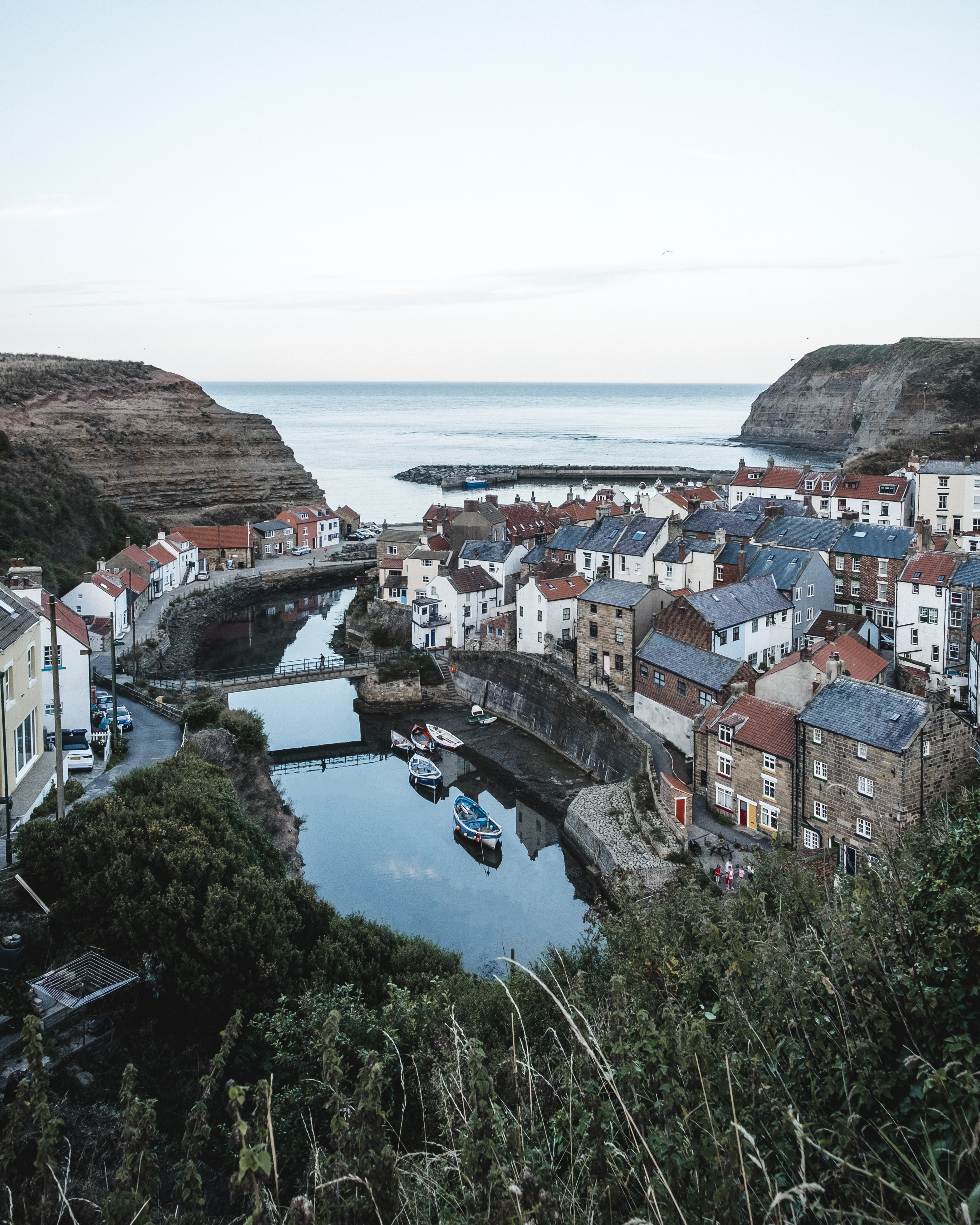 Coastal village with harbour and boats