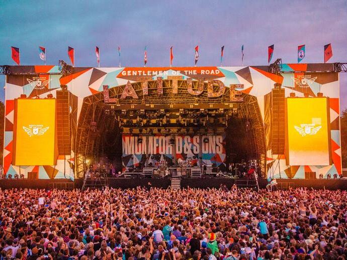 Mumford & Sons performing on the main stage of Latitude Festival