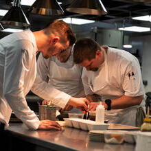Chefs working in the restaurant kitchen at Whatley Manor, Malmesbury