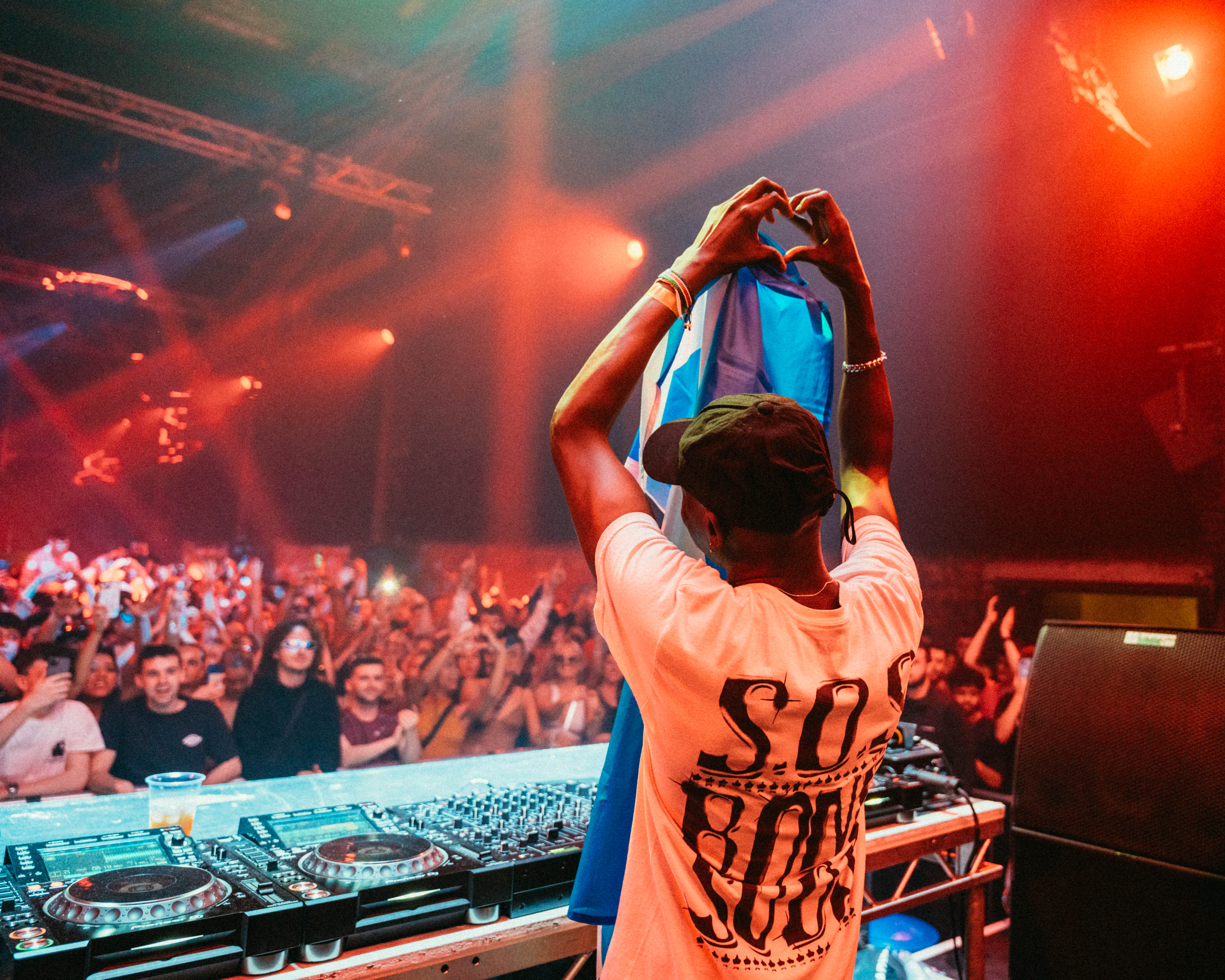 A DJ performing on stage at SWG3 Stage Warehouse in Glasgow