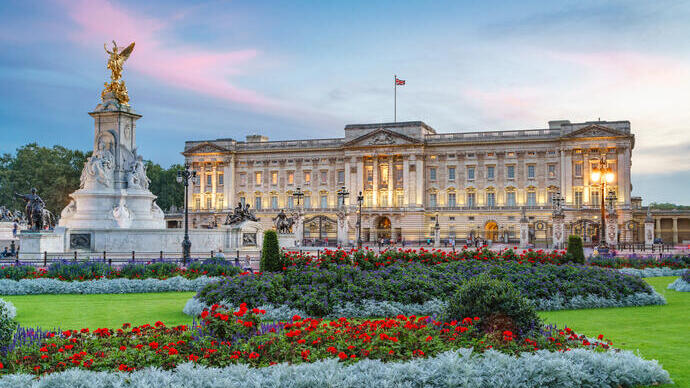 View of Buckingham Palace early morning with gardens in the foreground