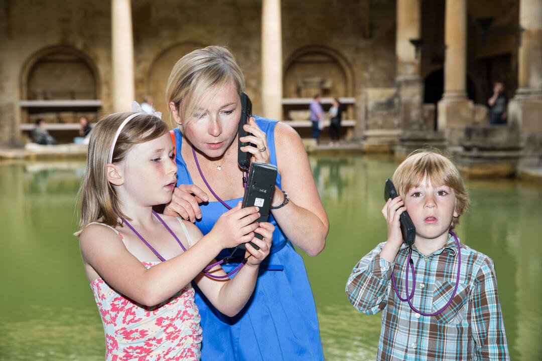 A family at the Roman Baths in Bath