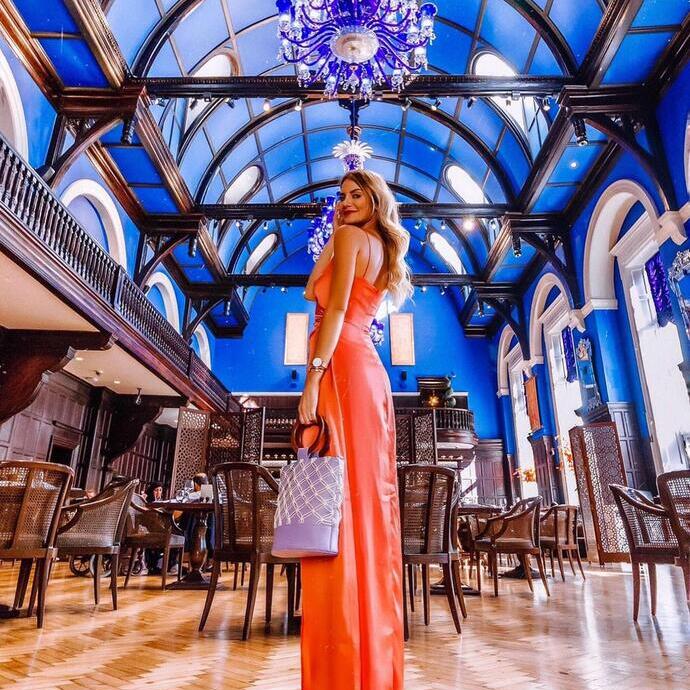 Woman with evening dress at The Lalit, London