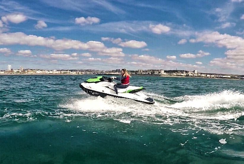 Pump up the adrenaline, person on a jet ski in Brighton
