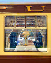 View looking into one of the carriages of Belmont British Pullman train