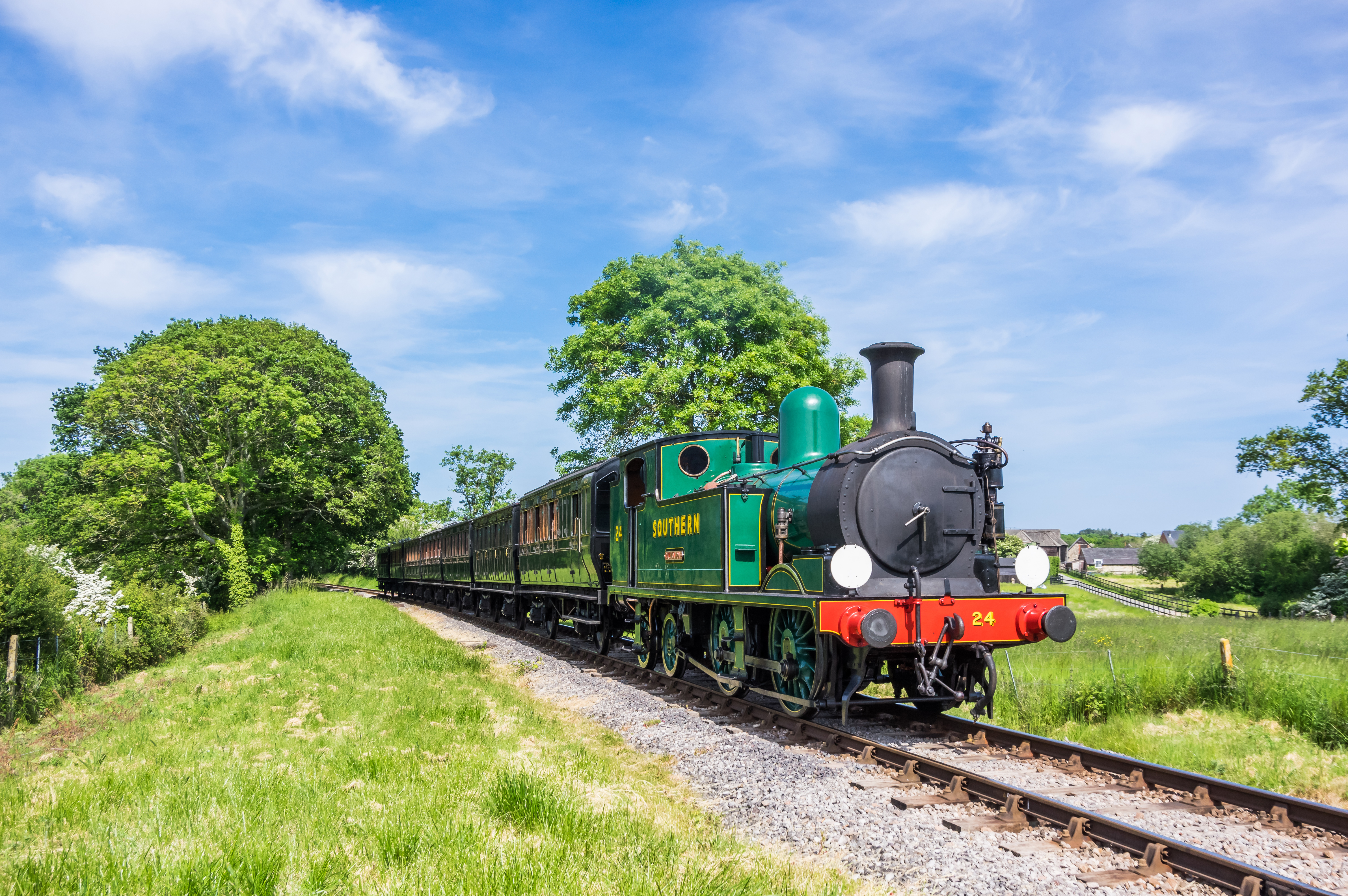 A steam engine train in the countryside