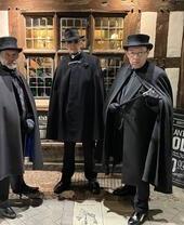 A group of tour guides on a ghost walk in Stratford-upon-Avon