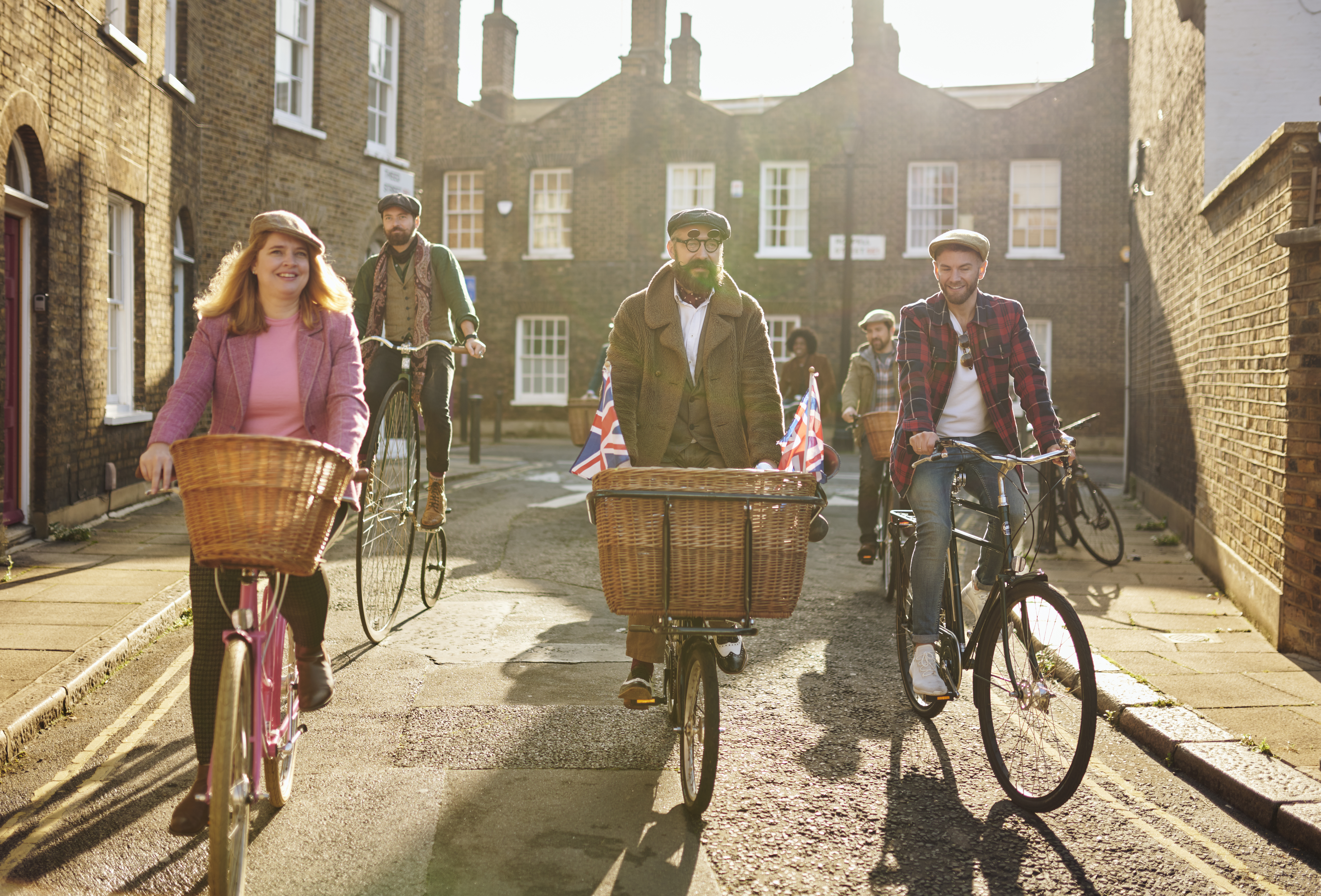 Tally Ho! Gin Safari experience tour guides and tourists cycling around London