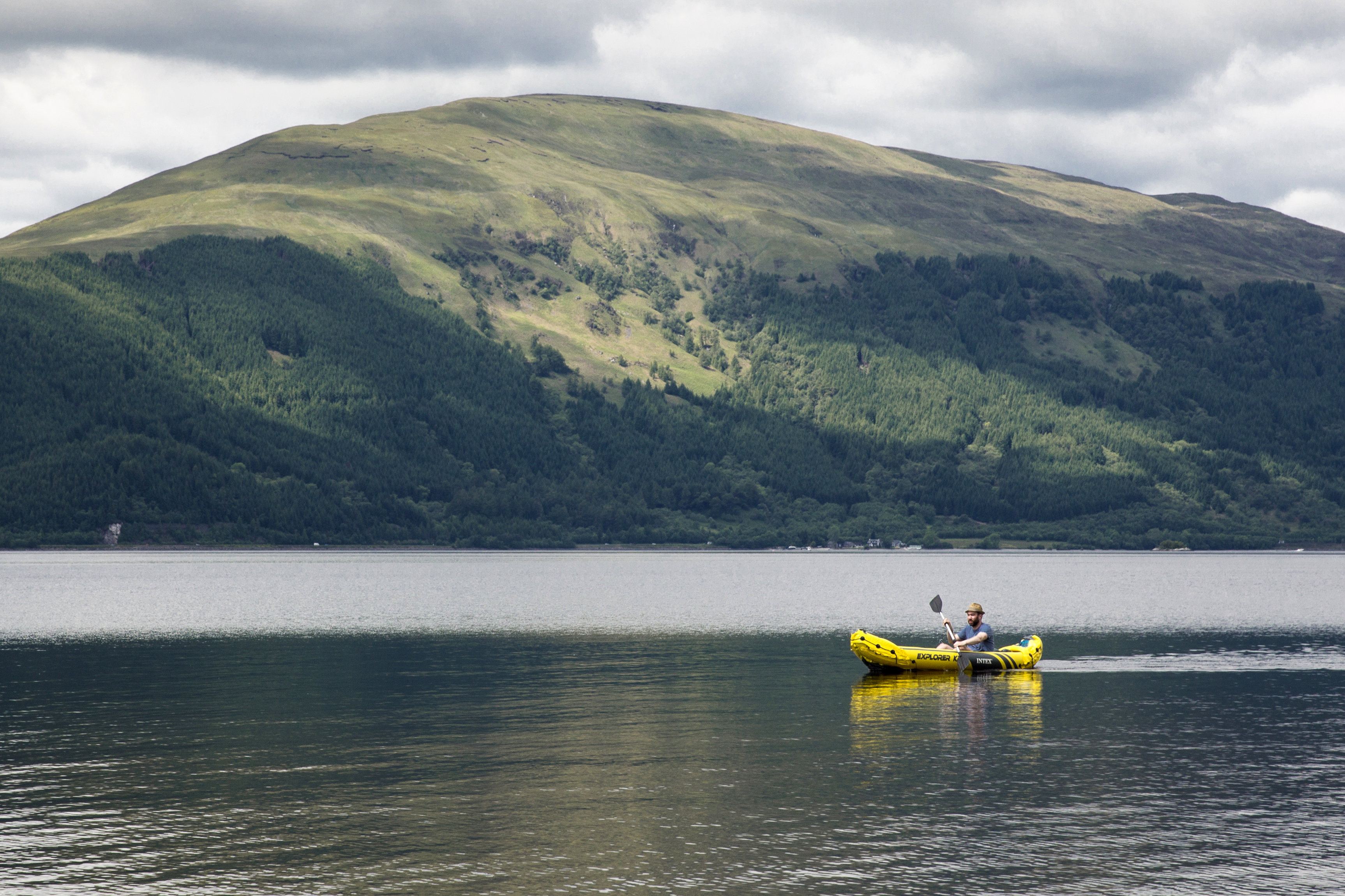 Person kayaking on a lake