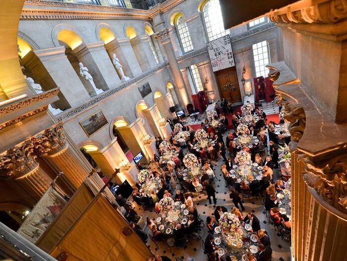 High angle view of people dining inside an historic palace