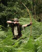 Man dressed up as Robin Hood in Sherwood Forest