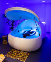 A man floats in at pod at Float Works