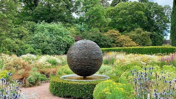 Landscaped garden with decorated fountain