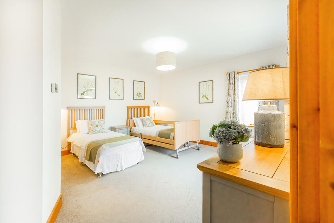 Cottage bedroom with disabled friendly bed