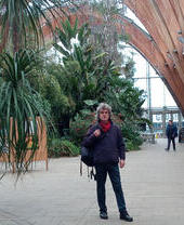 A man posing at an indoor garden as part of the Sheffield City Walking Tours
