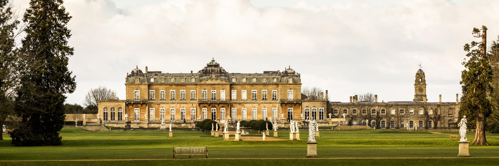 A formal Country Estate, and its lake and formal gardens and manicured lawns