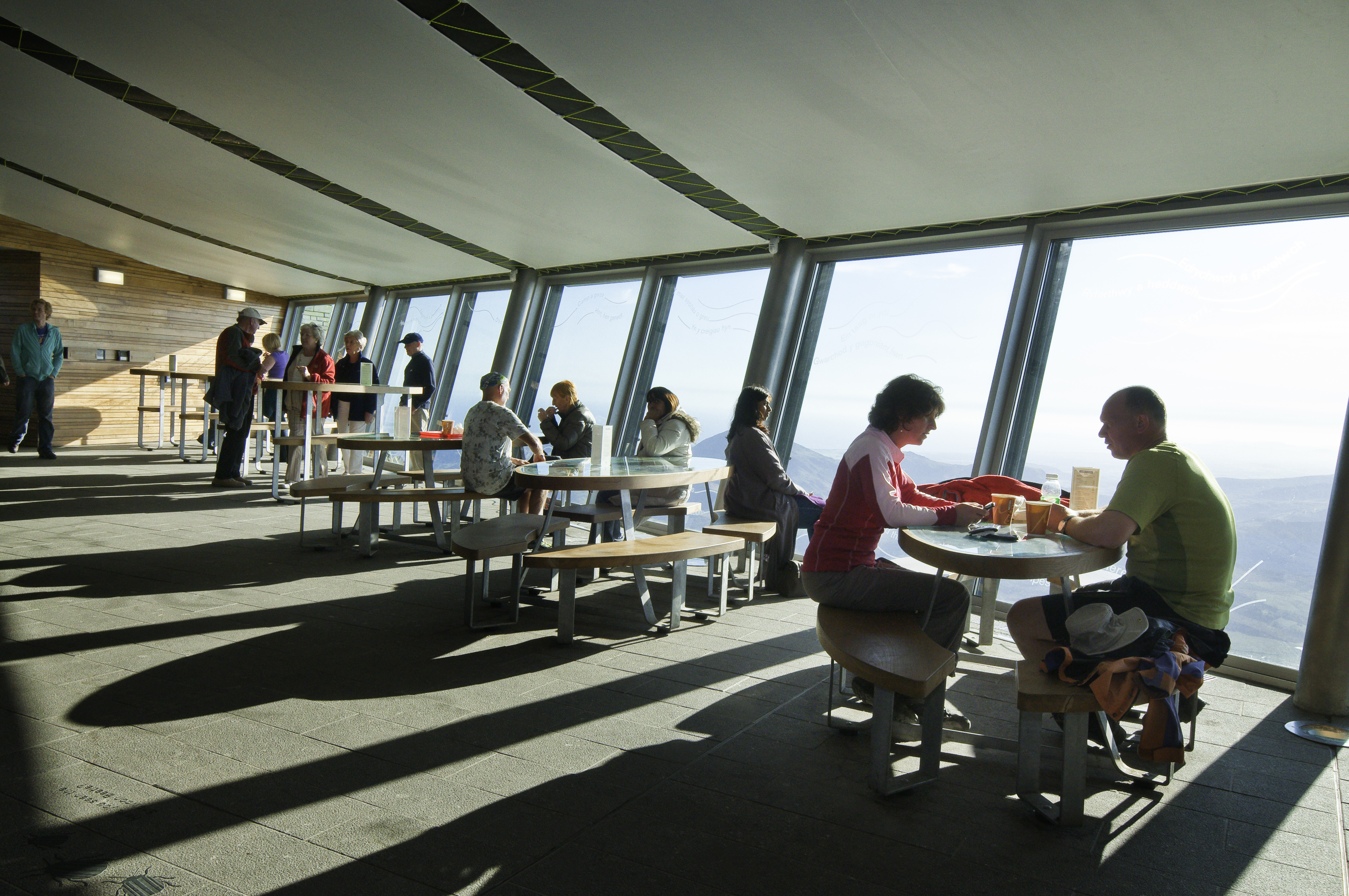 Walkers dining in a café situated high on a mountain